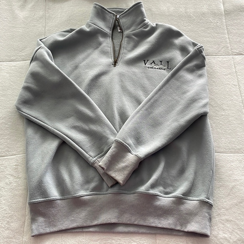 Light blue quarter zip sweatshirt
